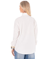 מכופתרת כפתורי זהב