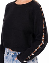 סריג פתחים בשרוול