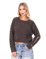 סריג פתחים בשרוול