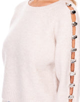 סריג פתחים בשרוול