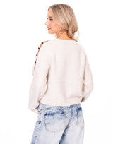 סריג פתחים בשרוול