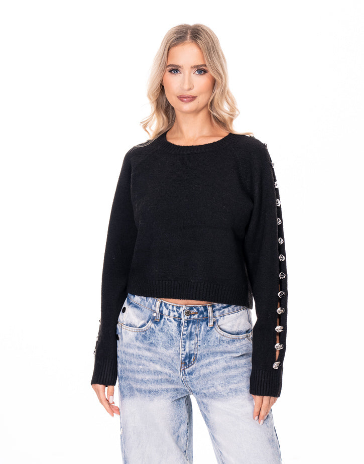 סריג פתחים בשרוול