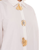 מכופתרת כפתורי זהב